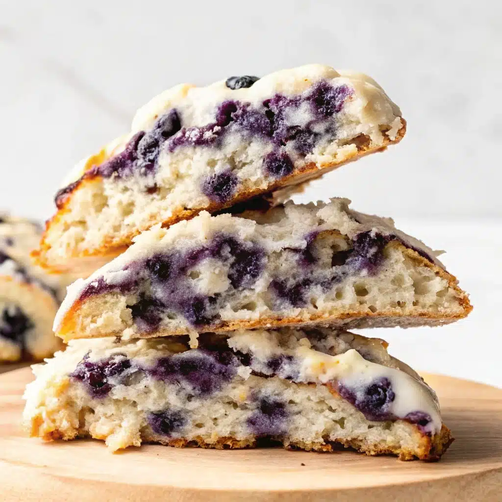 Stacked blueberry biscuits sliced in half