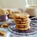 4 ingredient peanut butter cookies cooling on rack